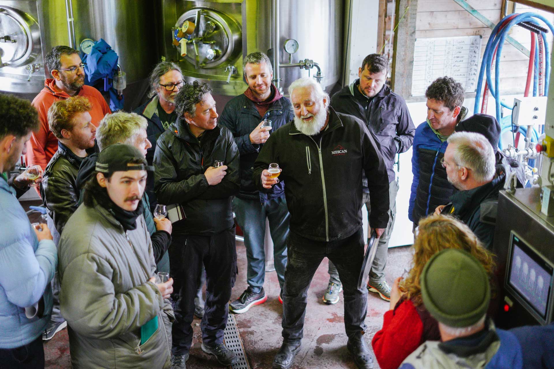 Cillian addressing a group of visitors
